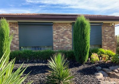 Security roller shutters installed on a modern residential property